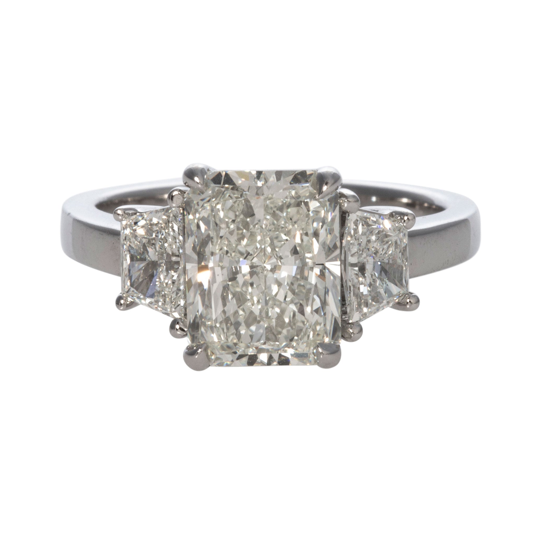 3ct Radiant & .71ct Trapezoid Side Diamond Three-Stone Platinum Ring